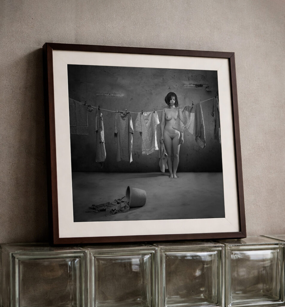 Fine art photograph in a square frame displayed in a modern interior